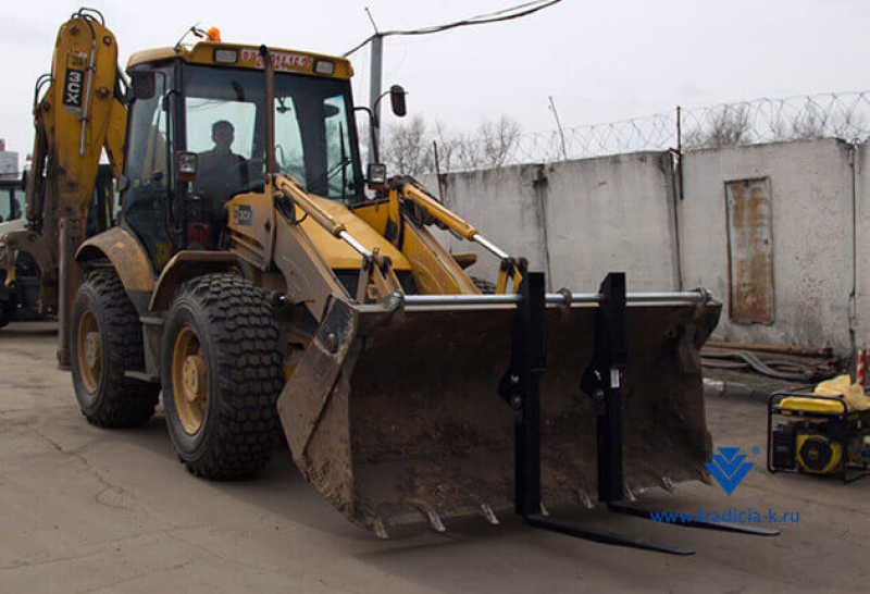 Вилы откидные паллетные Impulse PF2000 на ковш JCB 3CX / 4CX HV Market